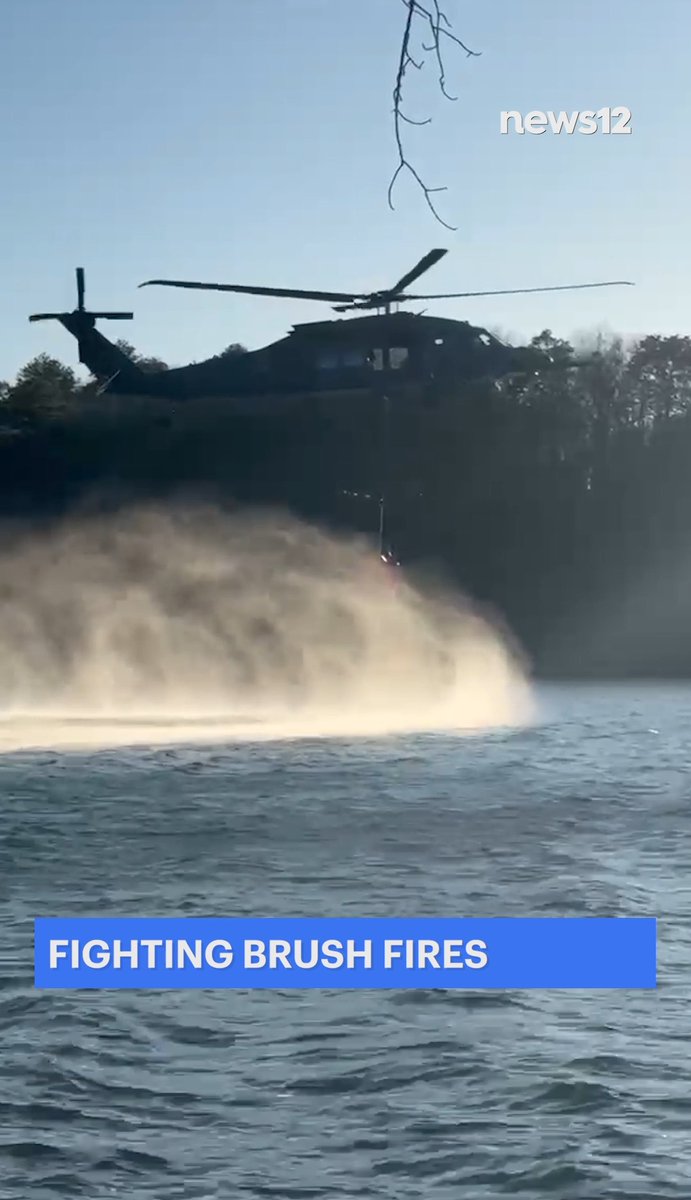 106th Rescue Wing HH-60W Jolly Green ll using 'Bambi Bucket' to help with the blaze along the Sunrise Highway. (Courtesy: Tatiana Shulman Barrios Flores) - #LongIsland #fire #breakingnews