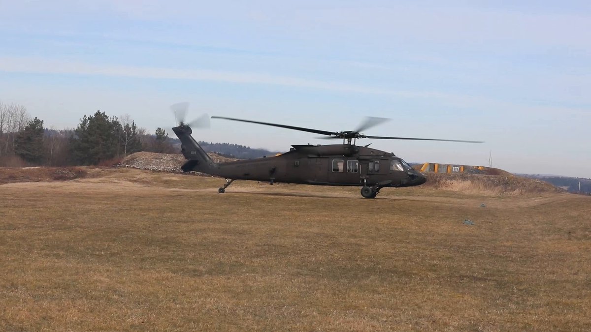 READY FOR ANYTHING! U.S. Army soldiers assigned to 1st Battalion, 214th Aviation Regiment, hone their skills on the Sikorsky UH-60 Black Hawk. With weapons qualification and driver training, they remain a critical aviation support force.