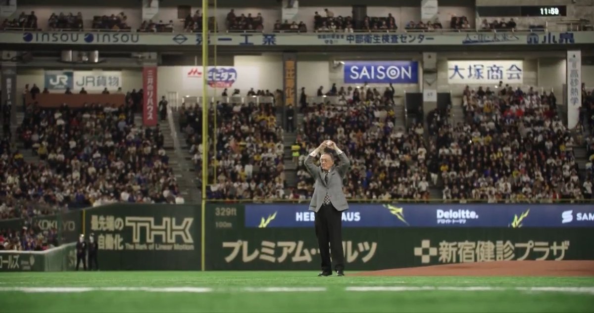 Masanori Murakami throws the ceremonial first pitch ahead of a Cubs exhibition game against the Hanshin Tigers. Murakami was the first Japanese-born player to reach MLB.