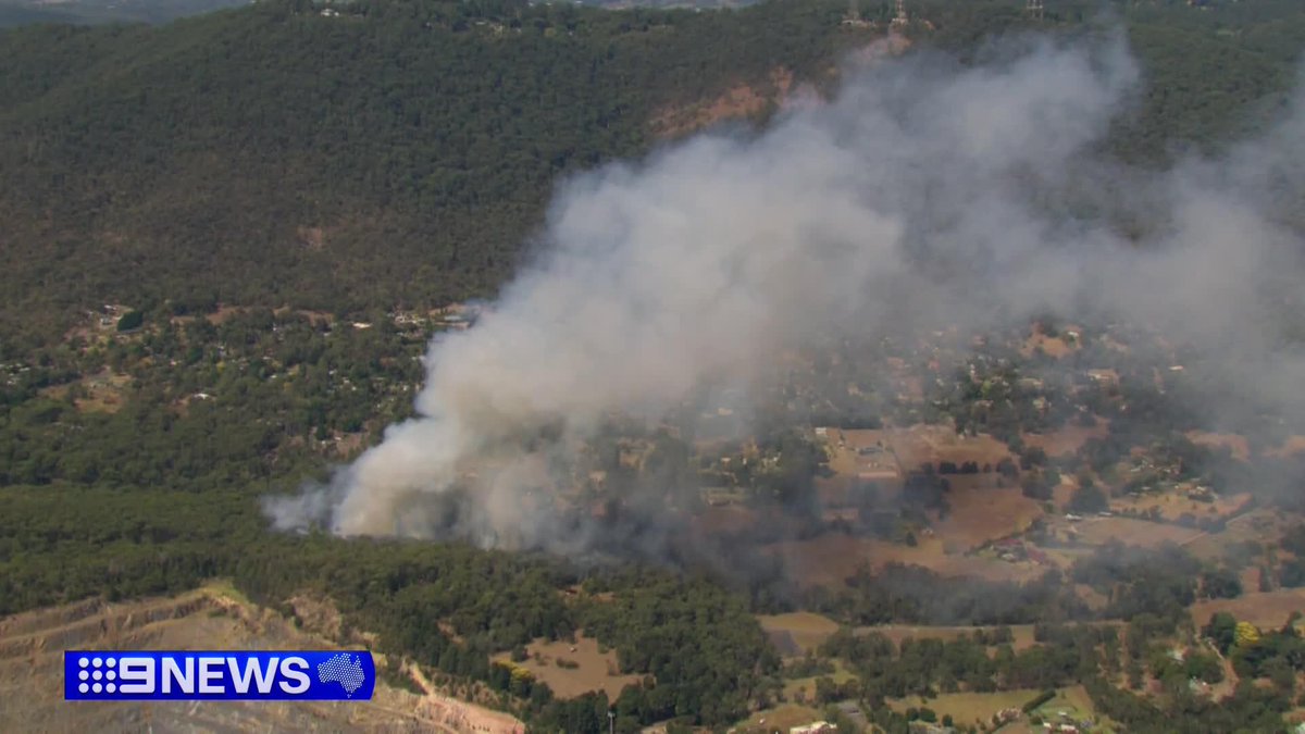 An out of control bushfire is burning dangerously close to homes at Montrose in Melbourne's east. A Watch and Act warning has been issued with erratic winds and today's heat making it difficult for firefighters on the ground. Izabella Staskowski #9News