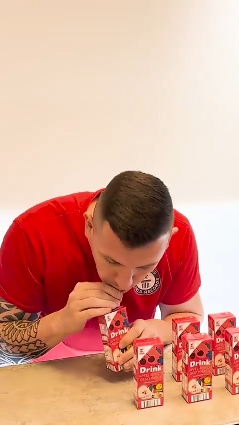 The most juice cartons drank in one minute - 6 by André Ortolf (Germany) 🧃