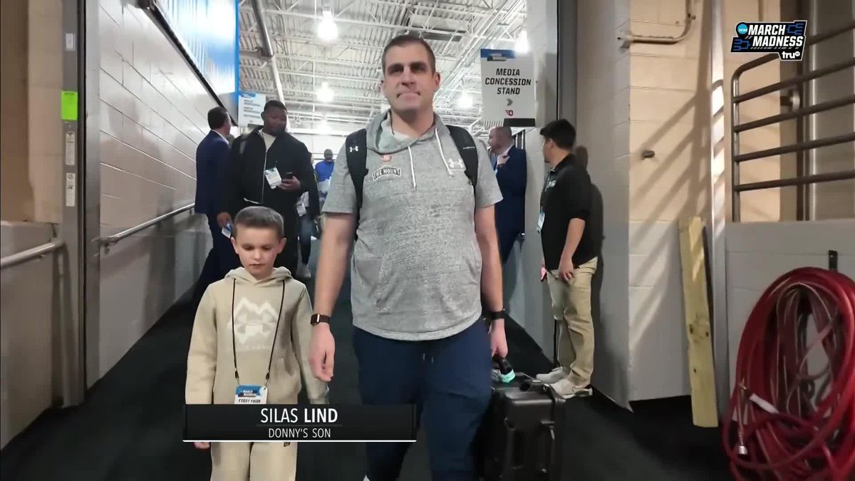 Coach Donny Lind and his son, Silas. This is the best ❤️
