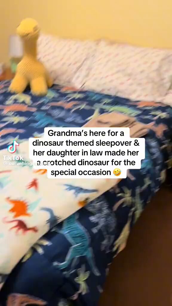 Grandma gets a handmade dinosaur, her reaction is priceless