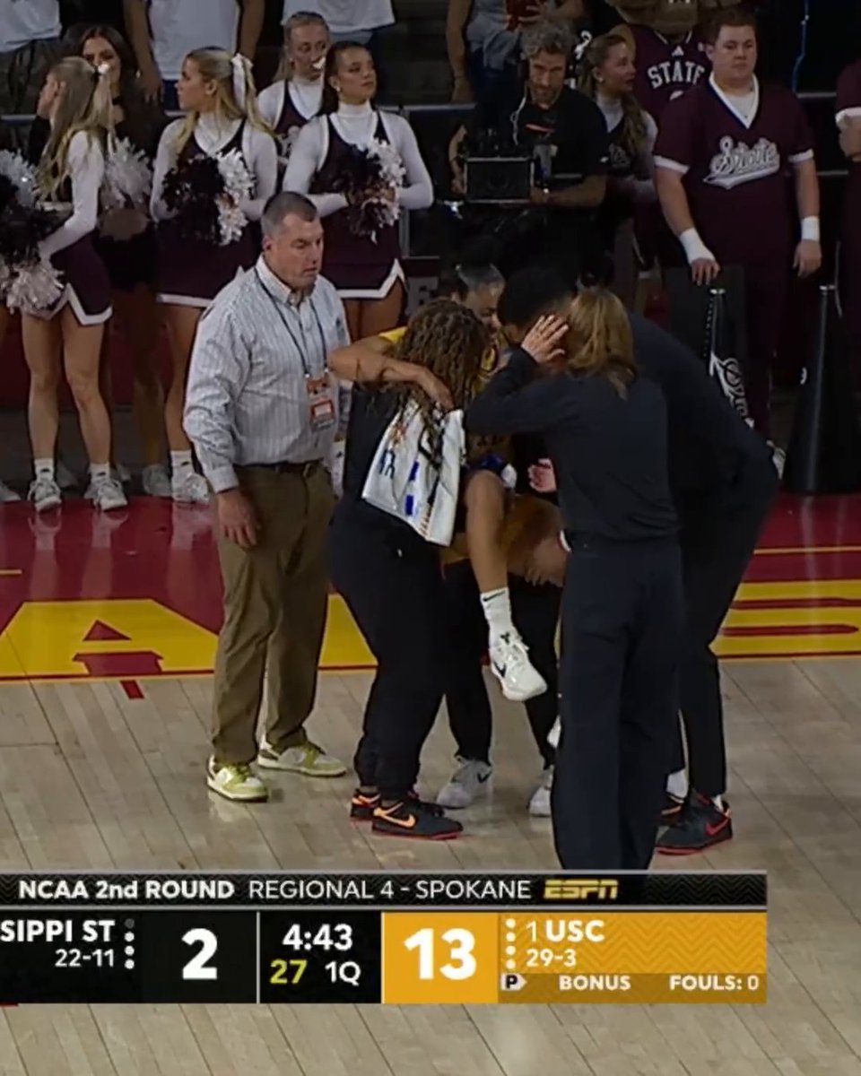 JuJu Watkins was carried off the court and taken to the locker room after suffering an injury on this play.