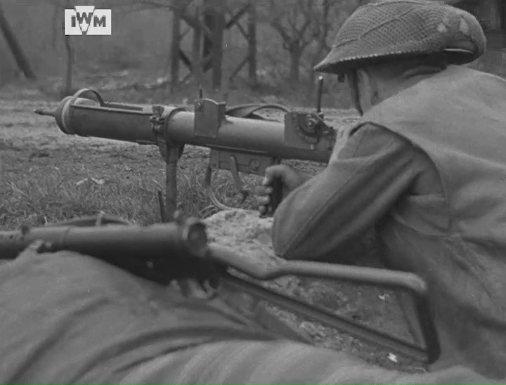 A British soldier of the Somerset Light Infantry filmed with a PIAT projector during the assault on Anholt, Germany, 29 March 1945. Film: IWM A70 285-4
