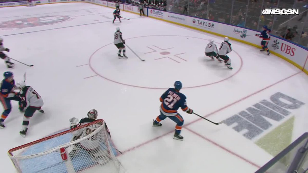 Palmieri's never in the blue paint, and even with the contact, seems like the goalie has time to reset. Situation Room was put in a tough spot with the call on the ice being "no goal." Without that I bet it stands. GWG taken off board, heartbreaker for the Isles.