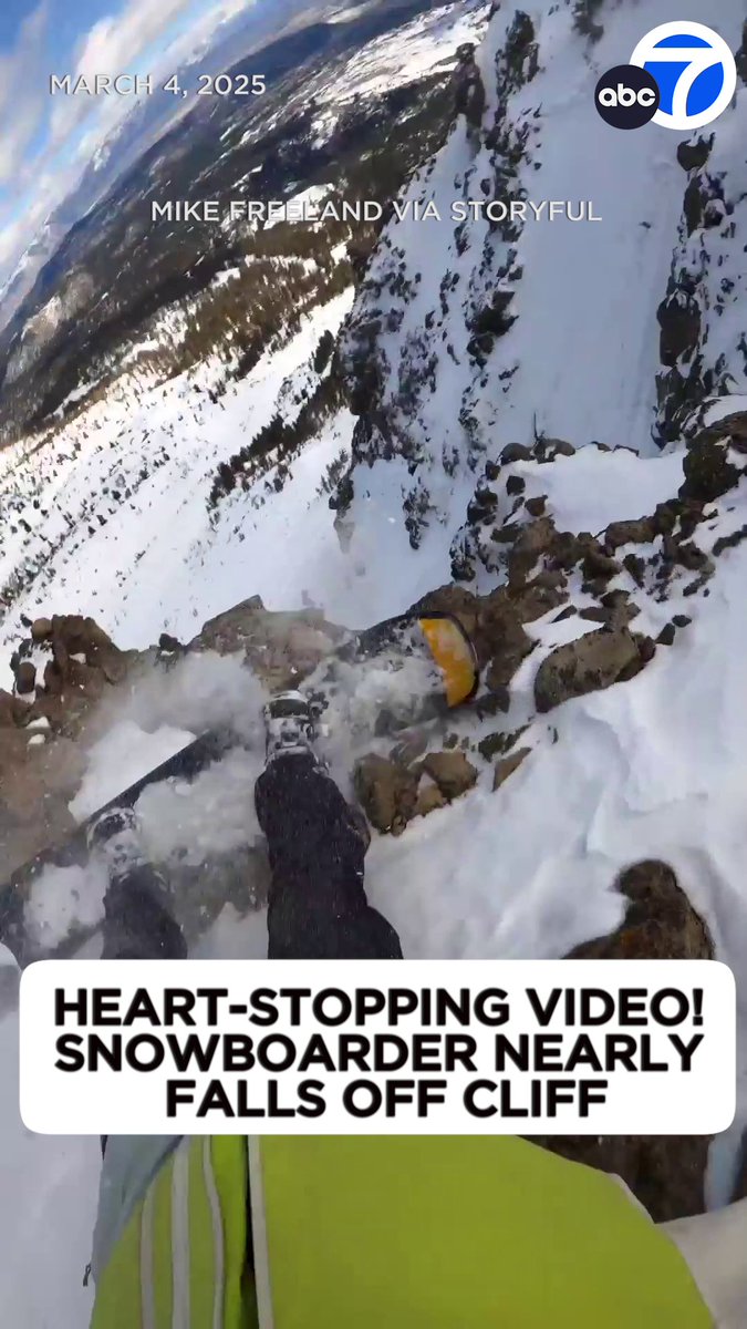 Heart-stopping video shows the moment a snowboarder nearly falls off a cliff while descending a mountain in Mammoth.