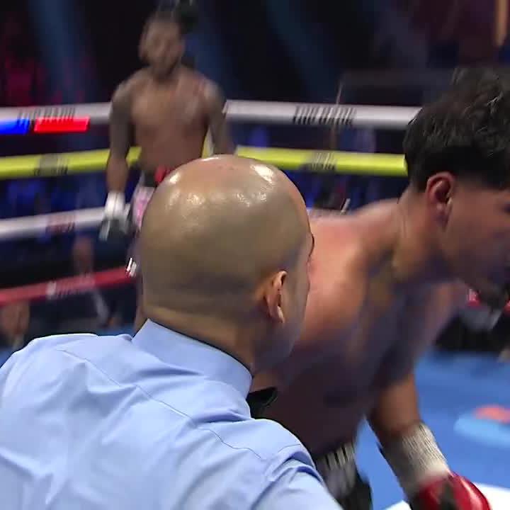 TOOK HIM OUT 😤 @TigerJohnson216 gets the finish with vicious body shots.