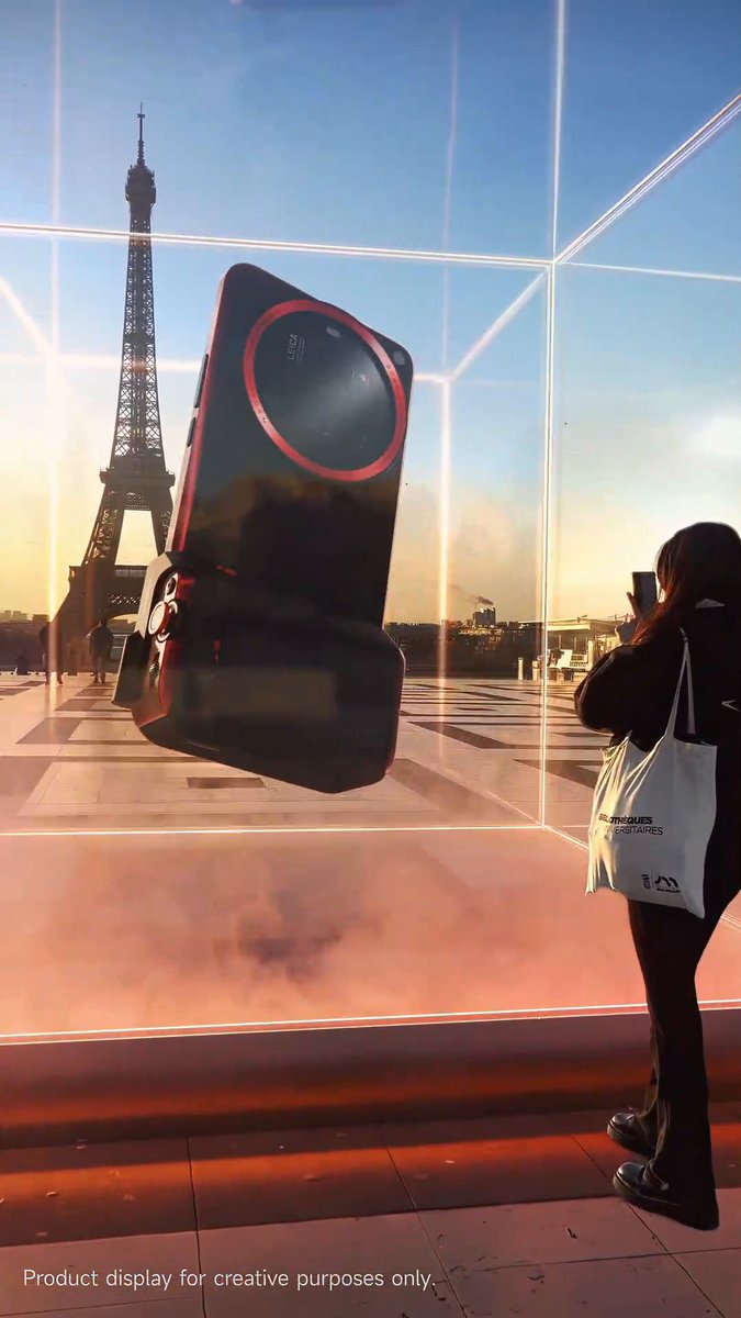Watch it transform. One touch, and it all comes together. 🚀 Under the Eiffel Tower, #Xiaomi15Ultra Photography Kit Legend Edition unfolds. Ready to make it yours? #PinnaclePhotography 🎥Nathan (IG: nathanfbr)