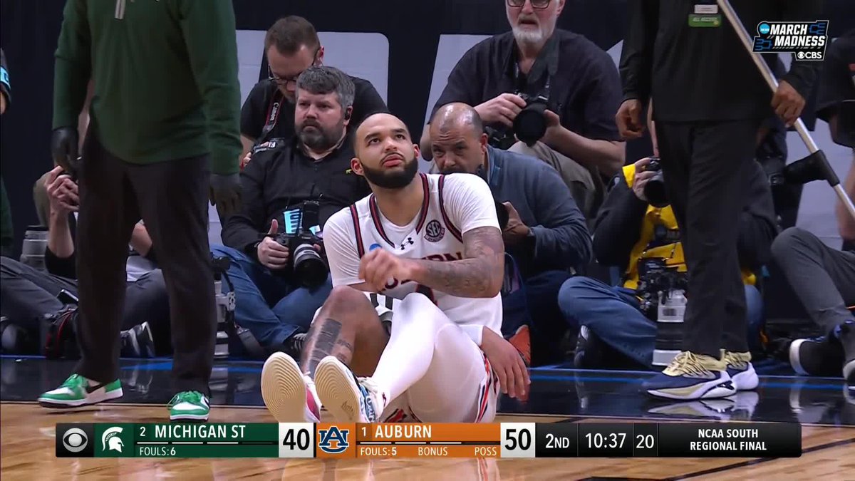 Johni Broome is down in noticeable pain
