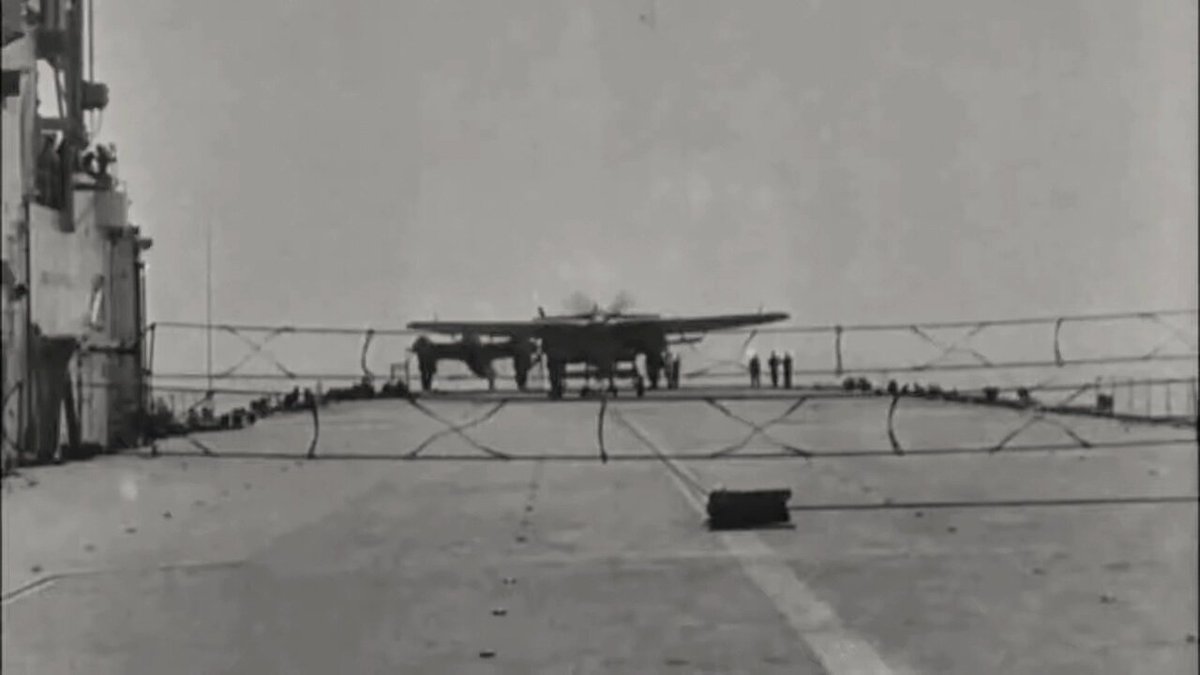 Crash barrier trials on HMS Triumph with a Fairey Barracuda and de Havilland Mosquito