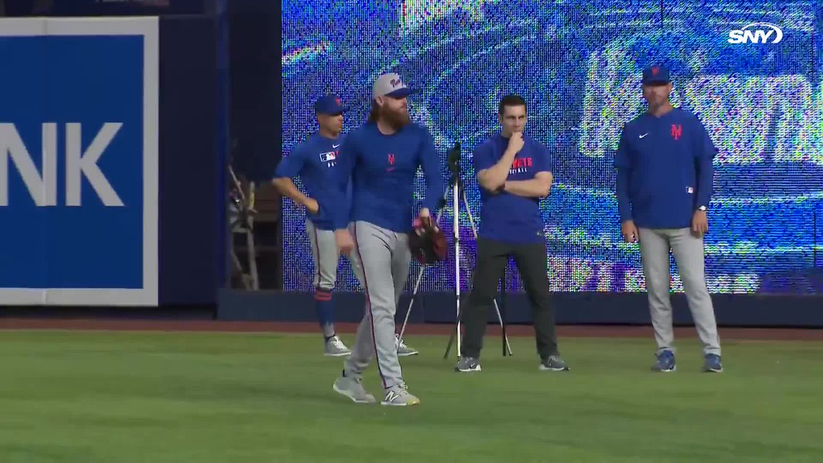 Paul Blackburn tosses in the outfield for the first time since landing on the IL