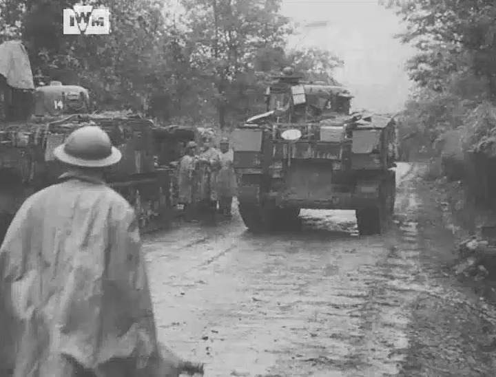 Infantry of the West Yorkshire Regiment walk by Lee medium tanks during the advance north from Imphal in Manipur, India, towards Kohima, 1944. Film: IWM MWY 27 <1/2>