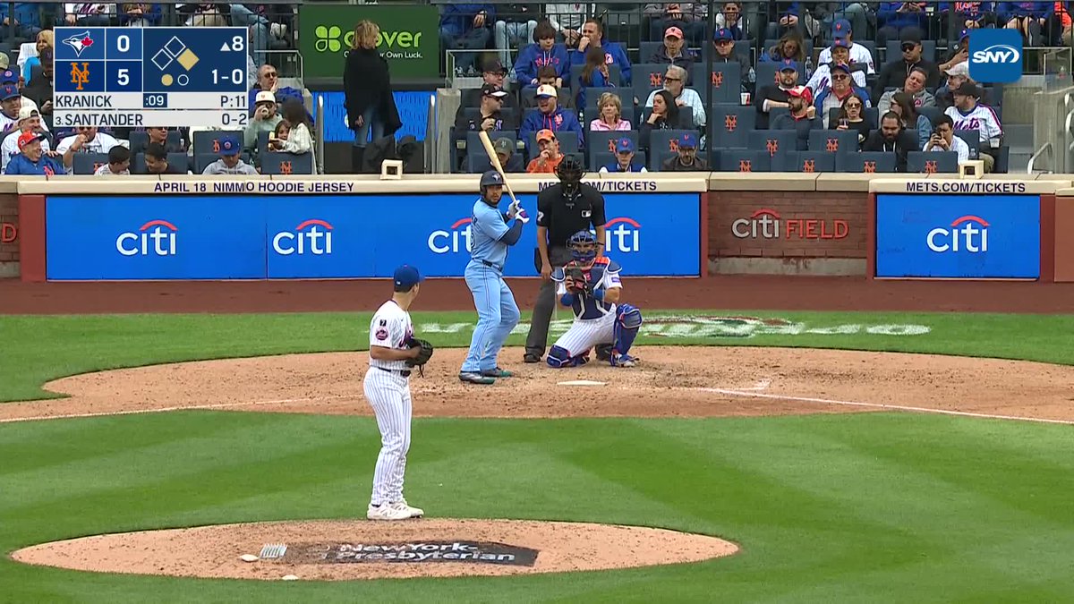 Juan Soto tracks down Anthony Santander's fly ball in front of the wall