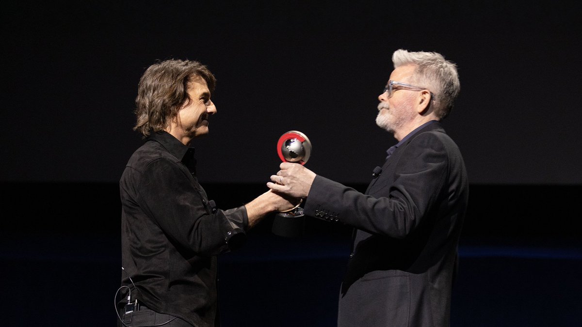 Tom Cruise presents Christopher McQuarrie with CinemaCon’s Director of the Year award, honoring his ambition and dedication to larger-than-life filmmaking. #MissionImpossible #CinemaCon