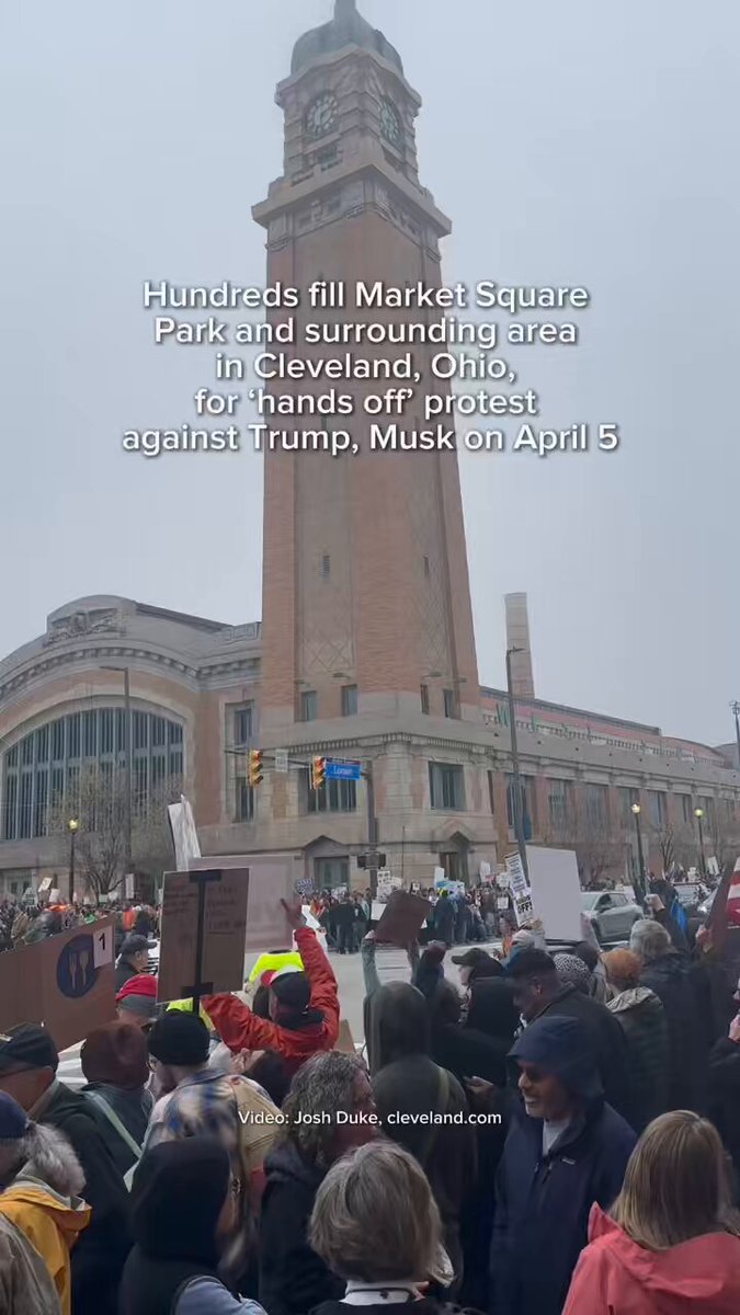 Hundreds are gathered at Market Square Park in Cleveland, Ohio, Saturday as part of the nationwide ‘hands off’ protest against President Trump and Elon Musk. The demonstration is one of more than 600 taking place across the country.