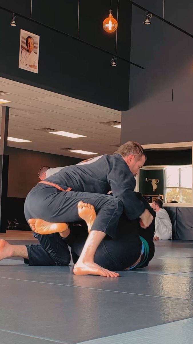 In Jiu Jitsu, you can’t just pass instantly. Just like you can’t instantly unite a cause with its effect. To pass instantly is to try to skip the resistance, the tension, the unfolding of the exchange. Every basic option (go-behind, tip-over, pass, submission) is a product of the stage of grappling you’re currently working through. To ignore that is to pretend effect can occur without origin. Acceleration blinds you to architecture. When you rush to control, you lose control. Speed, unchecked by timing, is noise. Power, unconnected from structure, is waste. Movement, without context, is an accident. The best skill of a passer isn’t pressure, it’s perception. It’s the ability to feel the invisible angle of intent by noticing the tension in the grips and the shape of the frames. That kind of awareness doesn’t simply come from motion, it comes from tempo. From matching energy. From feeling the structure while it’s still forming, not after it falls apart. when I say: “You can’t just pass instantly. Just like you can’t unite the cause with the effect instantly.” I’m not just making a technical point. I’m making a critique of modern urgency. I’m defending the time it takes to see, to think, to know. Learn Jiu Jitsu