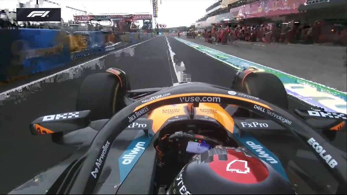 😱 Drama in the pit lane as Verstappen and Norris exit side by side jostling for the race lead! #F1 #JapaneseGP
