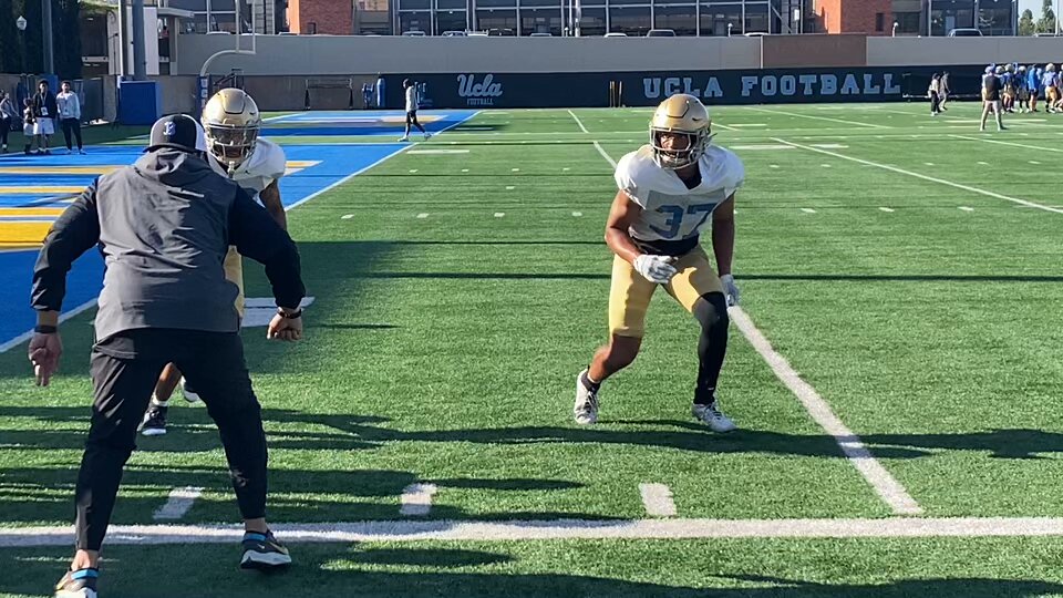 UCLA secondary coach Demetrice Martin instructing the defensive backs