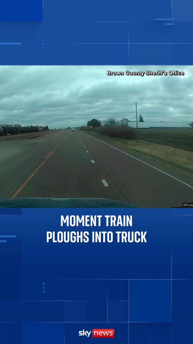 Footage shows a truck being hit by a train at a railroad crossing in the US. The passengers escaped with only minor injuries.