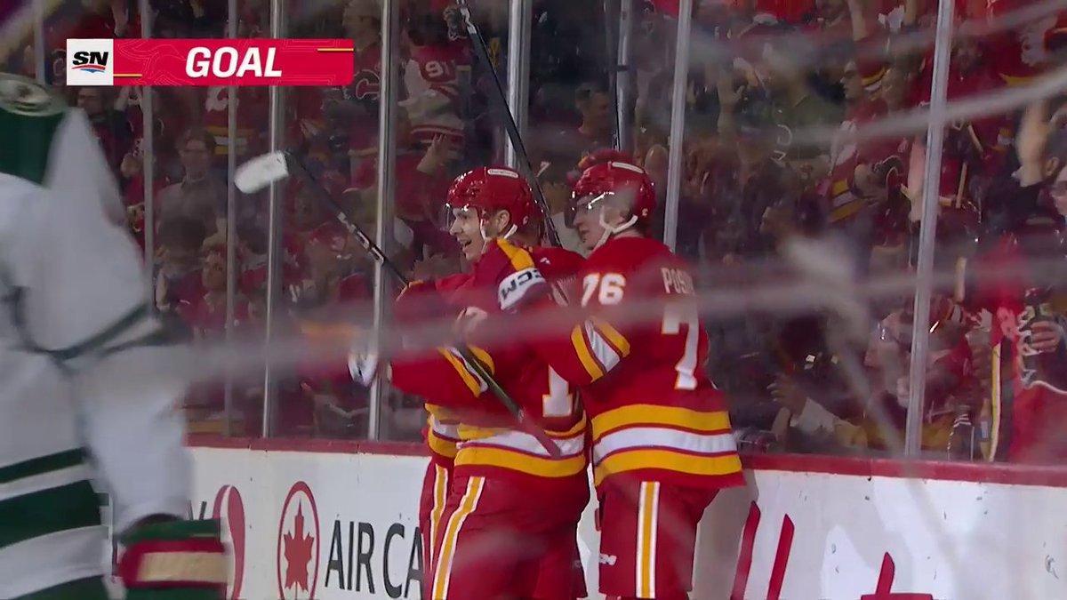 Yegor Sharangovich tips the puck out of mid-air to put the Calgary Flames up by a pair! ✌️