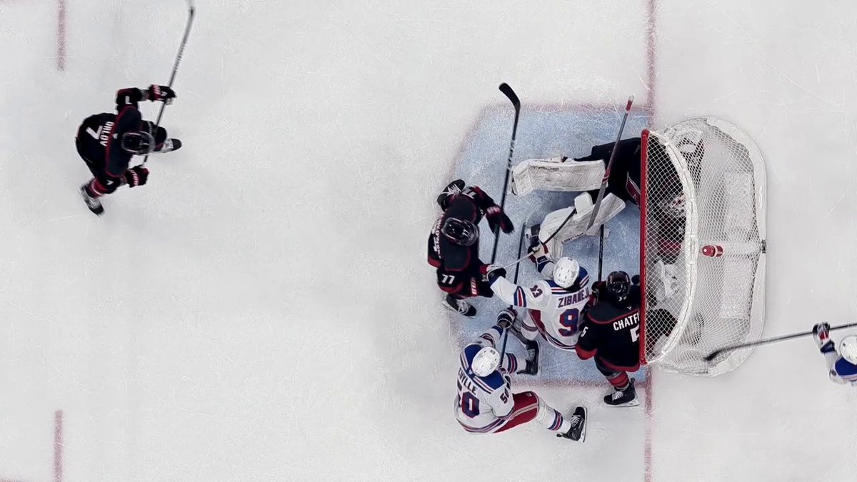 OH MY! WHAT A SAVE! 🤯 Pyotr Kochetkov and Jalen Chatfield team up to pull this puck off the goal line and keep the x - Carolina Hurricanes ahead by two! Team Players presented by Budweiser