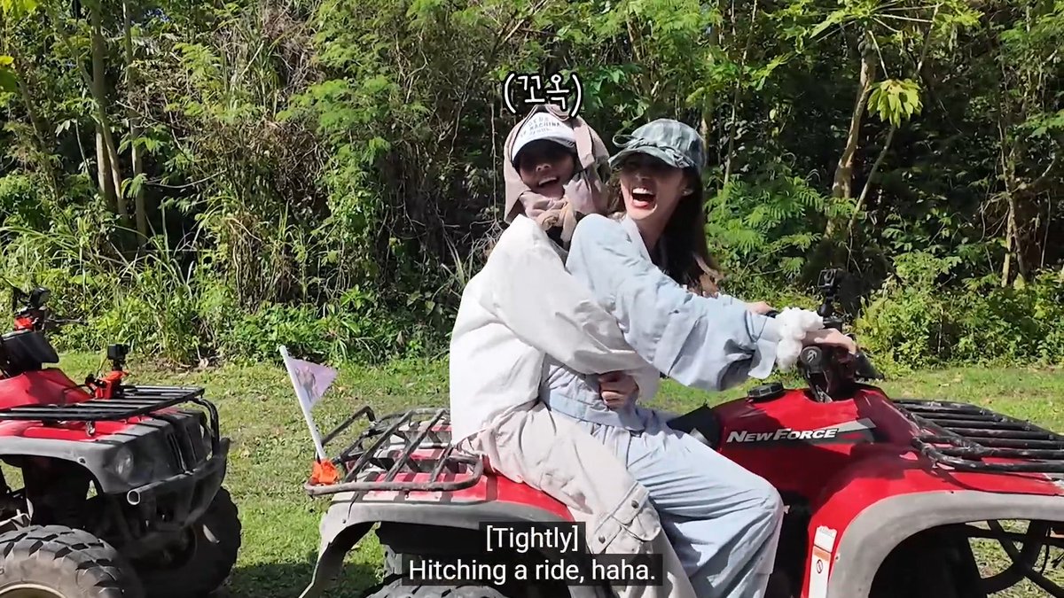 Sana driving the ATV with Princess Miyeon backhugging her