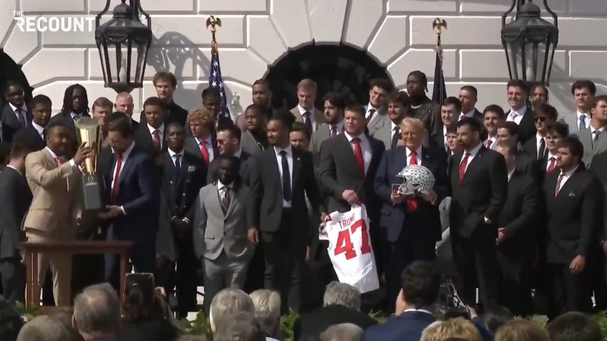 VP JD Vance fumbles the Ohio State's college football national championship trophy at the White House.
