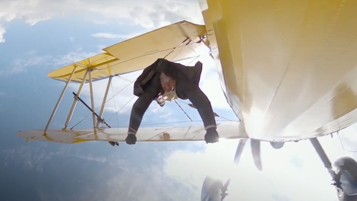 Tom Cruise performs a plane stunt in 140mph winds for #MissionImpossible: The Final Reckoning.