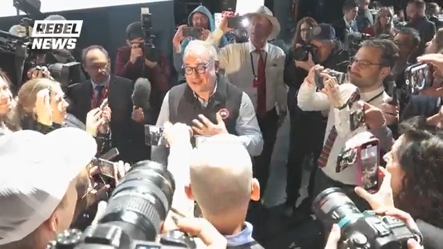 WATCH: Rebel News CEO Ezra Levant holds court at the federal leaders' debate after the mainstream media tried to kick him out.