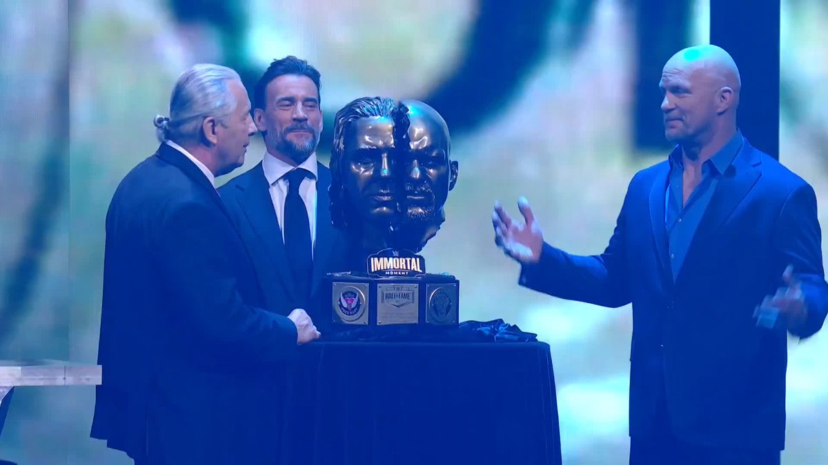 CM Punk welcomes out Bret "The Hitman" Hart & "Stone Cold" Steve Austin to receive the inaugural "WWE Immortal Moment" Award! 🏆 #WWEHOF
