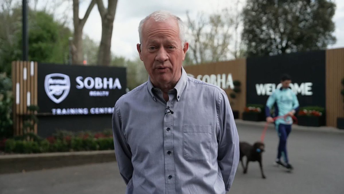 Just Gary Cotterill talking about Bukayo Saka at Arsenal's training ground with Mikel Arteta walking Win the dog in the background 🐕