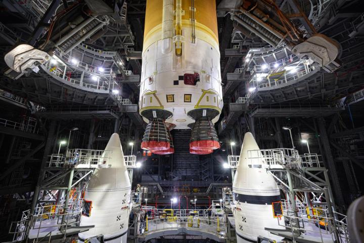 Big moves at NASA's Kennedy Space Center! Recently, technicians with ARCHIVED: NASA's Exploration Ground Systems lifted the fully assembled SLS core stage 225 feet in the air inside the iconic Vehicle Assembly Building and integrated it with the twin solid rocket boosters for #Artemis II. Learn more about what comes next for the mega Moon rocket: