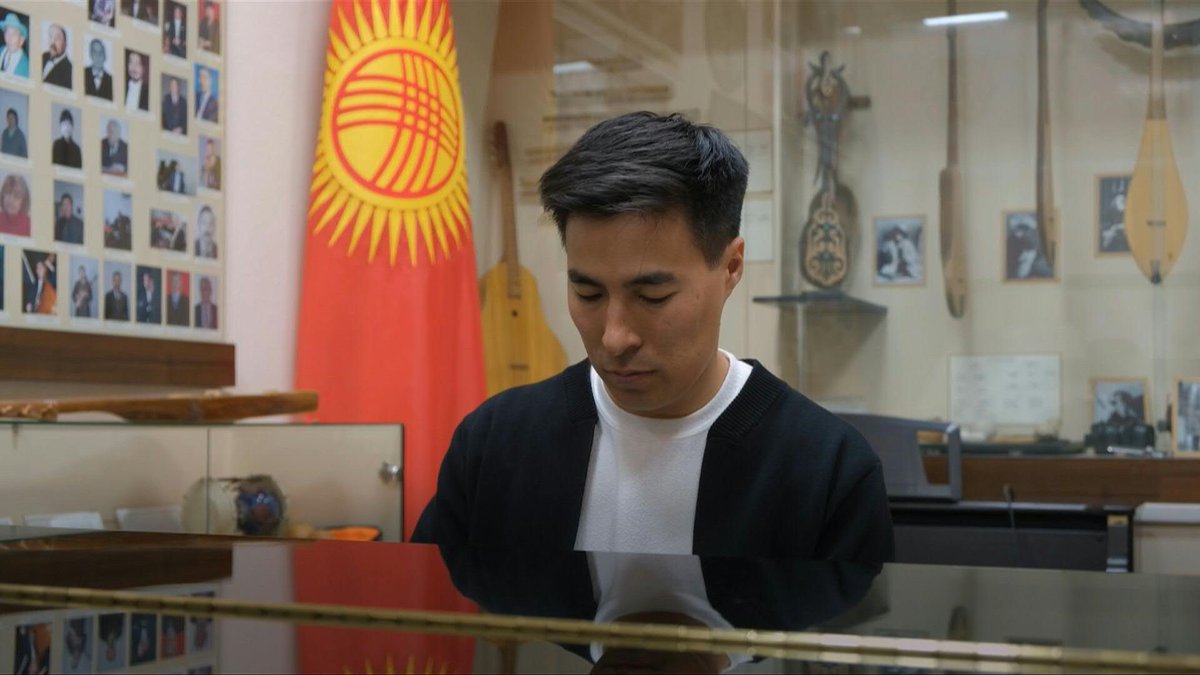 🇰🇬 VIDEO: Balasaguyn Musayev, is a 36-year-old composer and one of hundreds of Kyrgyz musicians who have submitted entries to create the new national anthem. Kyrgyzstan has launched an unprecedented public contest to find an alternative to its Soviet-inspired anthem.