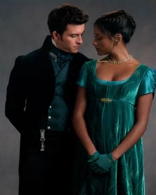 his waistcoat matching her dress WE GET IT YOU LIKE EACH OTHER 🙄