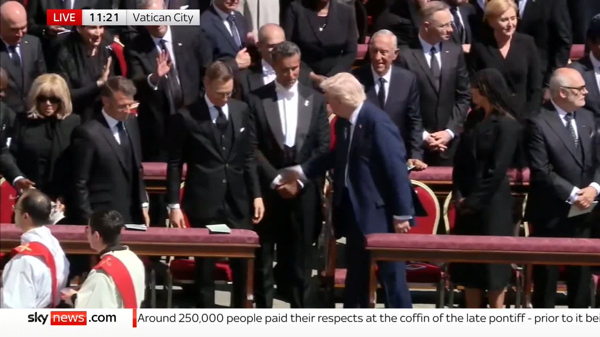 The congregation are invited to offer the sign of peace - by shaking each other's hands. Cameras quickly pan to the US president, who, after a short pause and a word from Melania, begins shaking hands with other world leaders. 📺 Sky 501 and YouTube