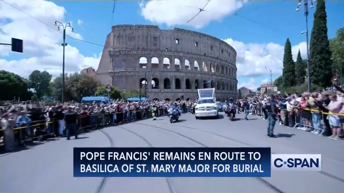 Pope Francis' casket drives by the Colosseum in Rome en route to the Basilica of Saint Mary Major.
