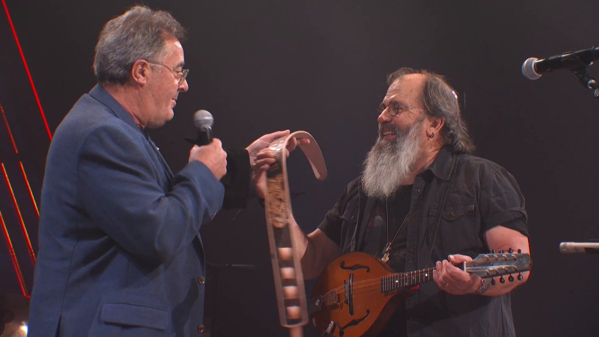 .Vince Gill surprised Steve Earle with an invitation to become the newest member of the Grand Ole Opry by presenting him with a custom guitar strap commemorating 100 years of the Opry! Watch the full moment below. We're thrilled to welcome you to the family, Steve ♥️