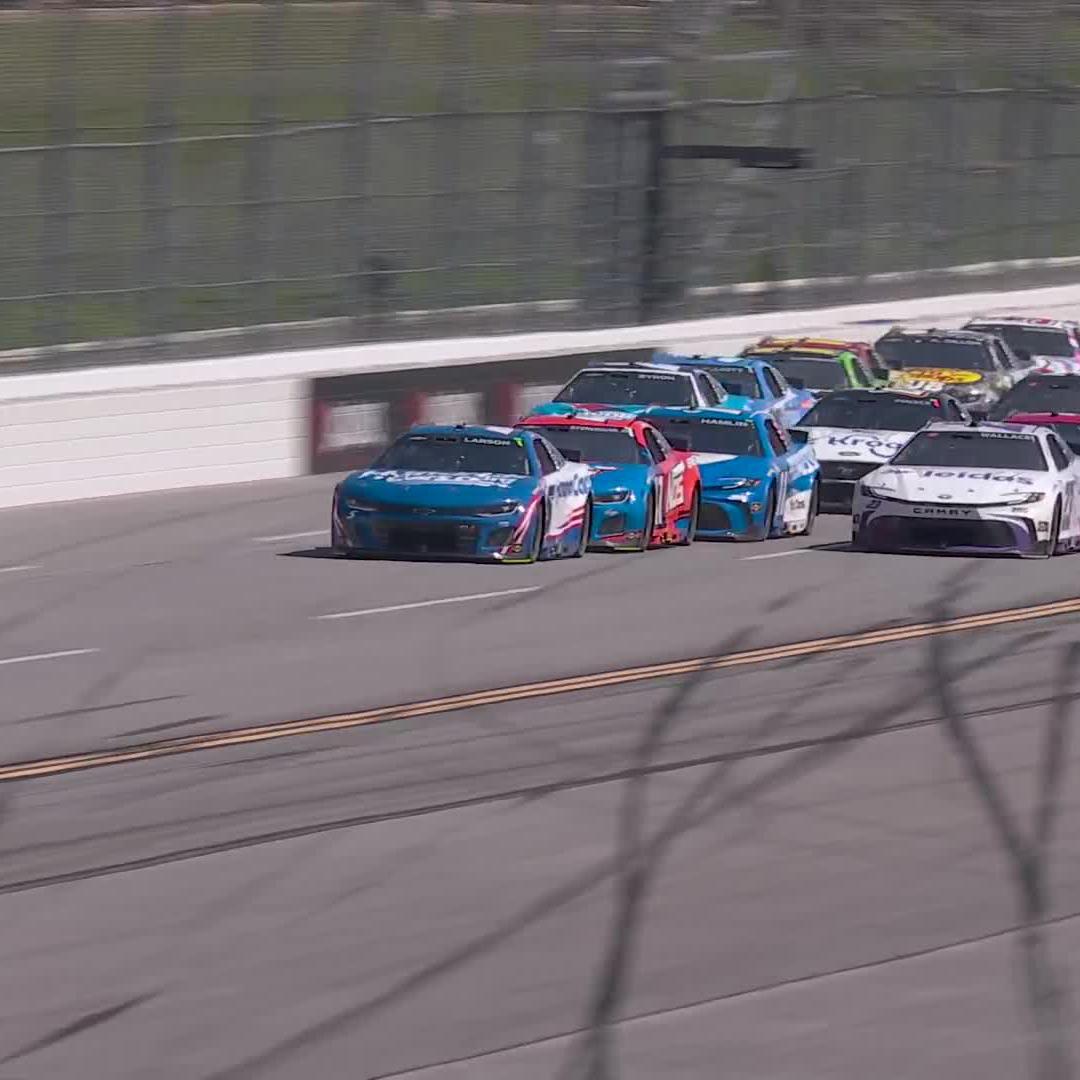 A big surge from Bubba Wallace, but Larson fought back on the outside.