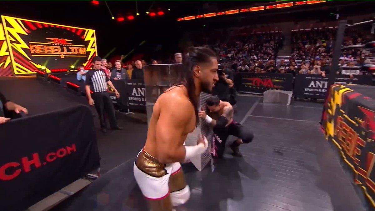 .Mustafa Ali just went HEAD FIRST into steel steps! WATCH #TNARebellion LIVE on TNA+:
