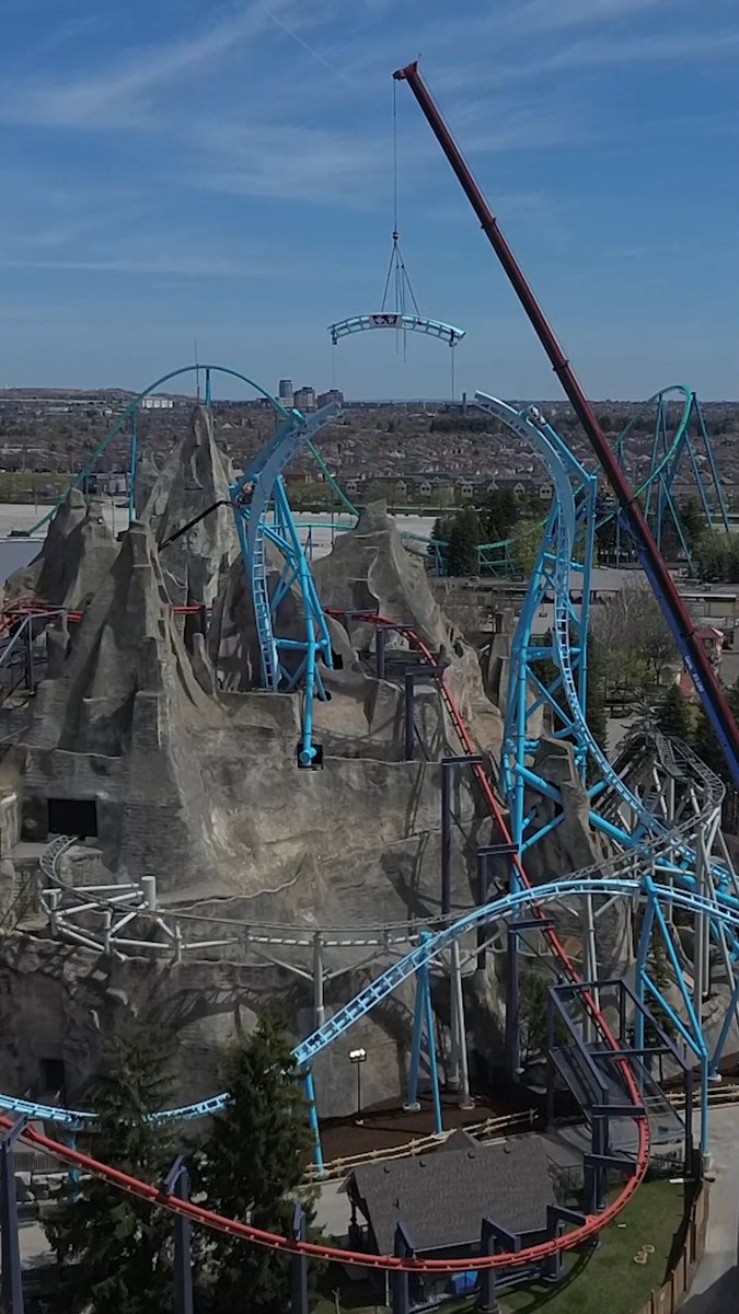 #AlpenFury just hit a major milestone, and it’s TOWERING! 🤯 The #tophat, the highest point of the ride is locked in and the view from up there? UNREAL. 🤩 💙🧡 #CanadasWonderland #LaunchCoaster #RollerCoaster #BTS #Drone #Toronto