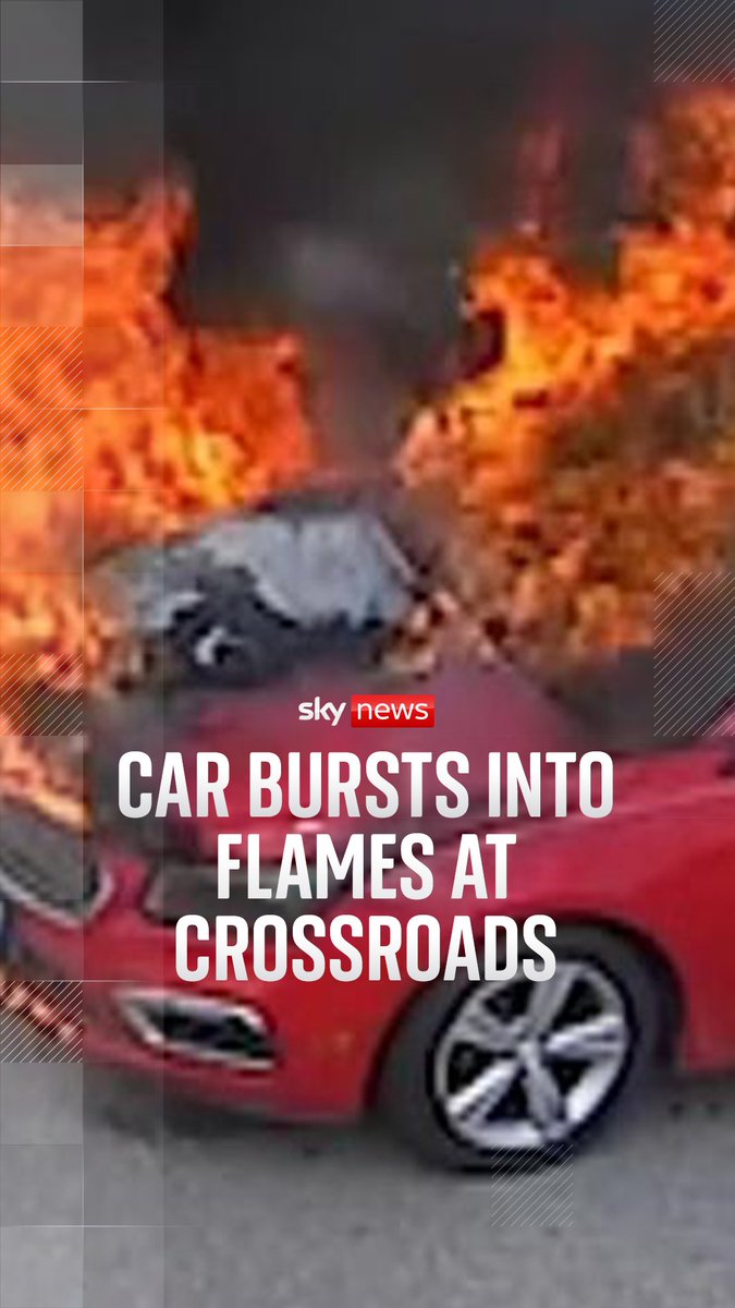 Traffic cameras pick up the moment car pulls up at a crossroads in Iowa with a smoking bonnet.