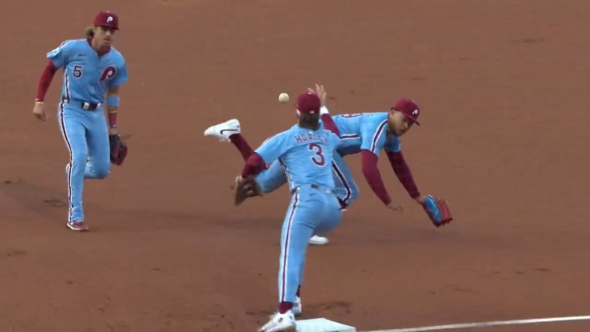 A glove flip and a barehanded catch on the same play?! The Philadelphia Phillies pull out all the stops to get the first out of the game!