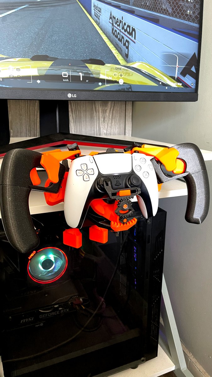 We printed this PS5 Controller Racing Wheel designed by Chad_Taylor, a fun and practical upgrade for your gaming experience. 🎮 💡 Printed on our Prusa CORE One using Prusament PLA Prusa Orange and Galaxy Black filament. Check it out here: