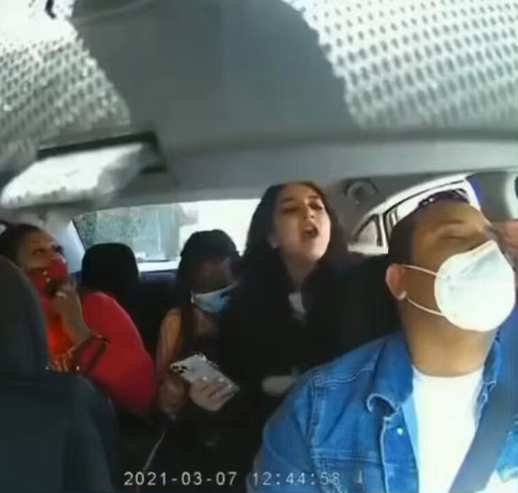 Uber driver harassed and coughed on by angry female passenger