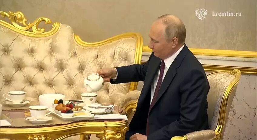 Putin, Xi Jinping, and tea with pastries after official talks.