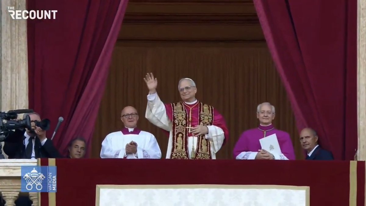 Pope Leo XIV, the first American pope elected by the conclave, appears on the balcony of St. Peter's Basilica.