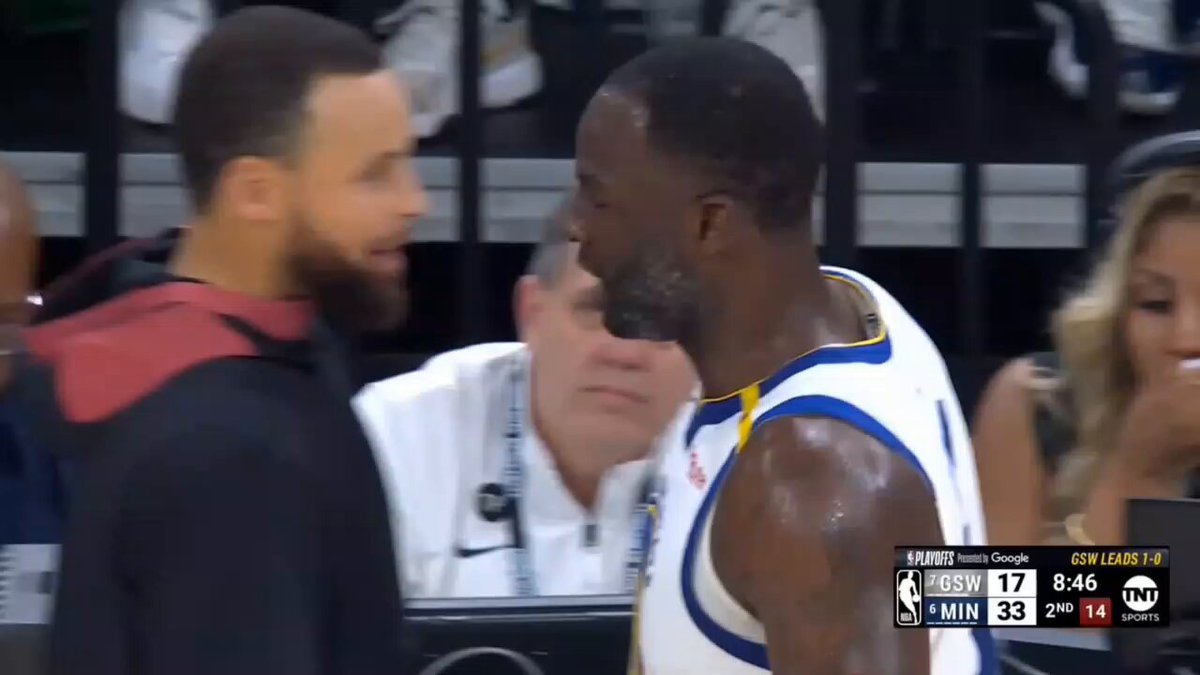 steph and the team trying to calm draymond down. he can't get another tech 😬