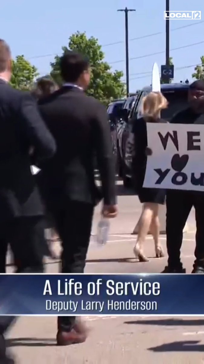 "We 🖤 You" @hilarious_scales brought a sign that read "We Love You" and said he wanted to be at Deputy Larry Henderson's service today to show that his community, "from the hood to the streets," is in support of the men and women in uniform.