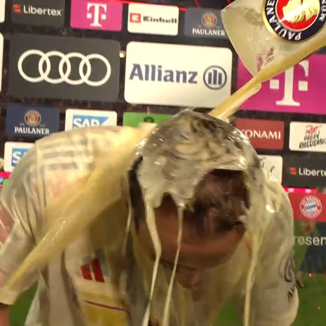 Harry Kane's first interview as a major trophy winner... and he's immediately mobbed with a beer shower! 🍻🏆